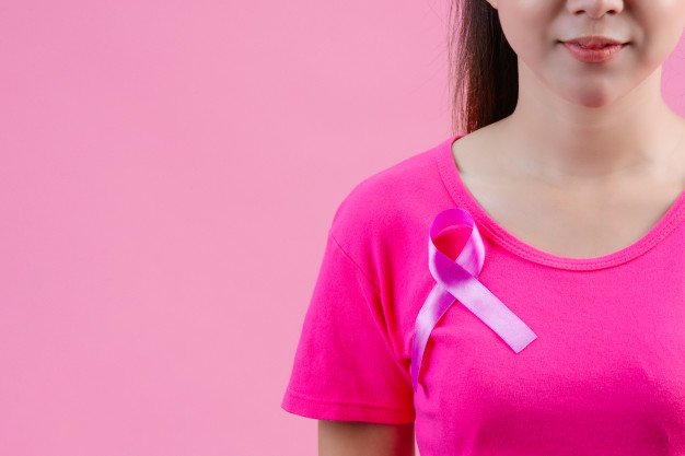 breast-cancer-awareness-woman-pink-t-shirt-with-satin-pink-ribbon-her-chest-supporting-symbolbreast-cancer-awareness_1150-18882.jpg
